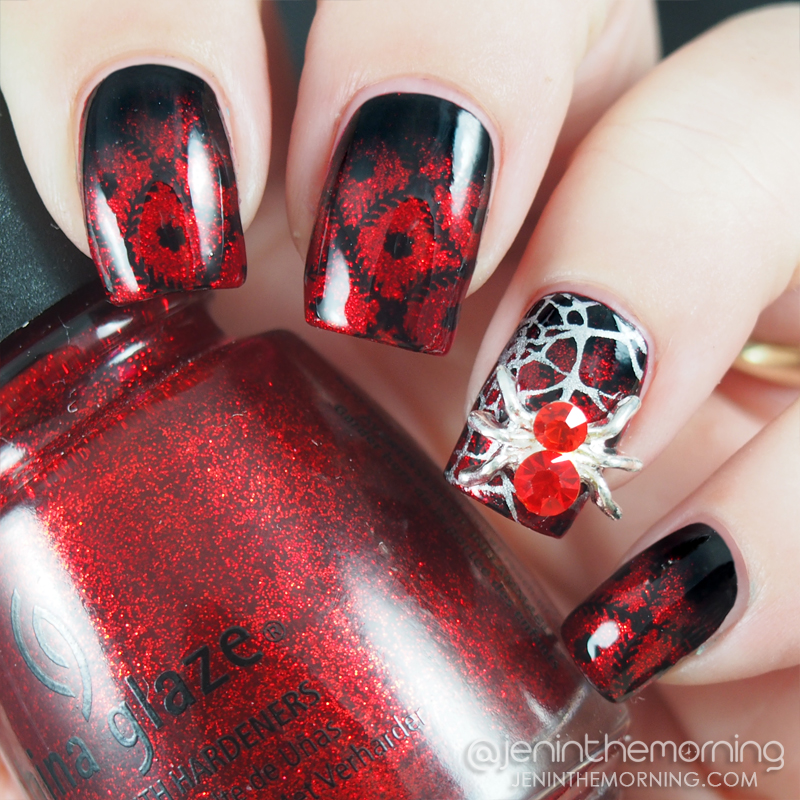 Red and black stamped gradient with spider charm