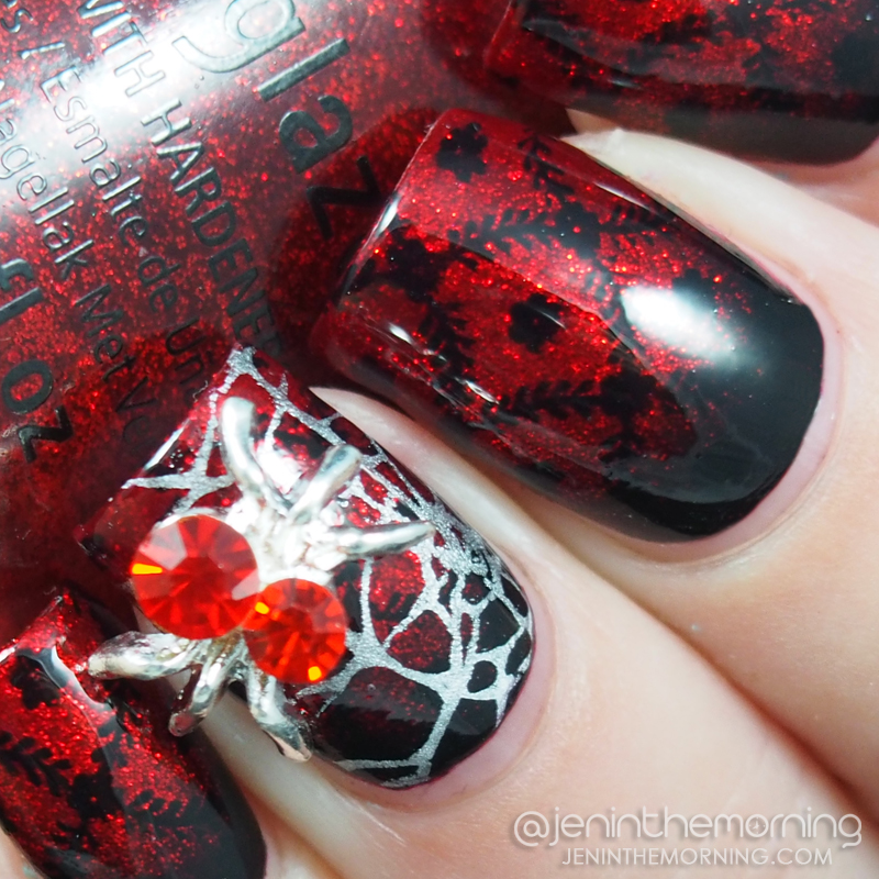 Red and black stamped gradient with spider charm
