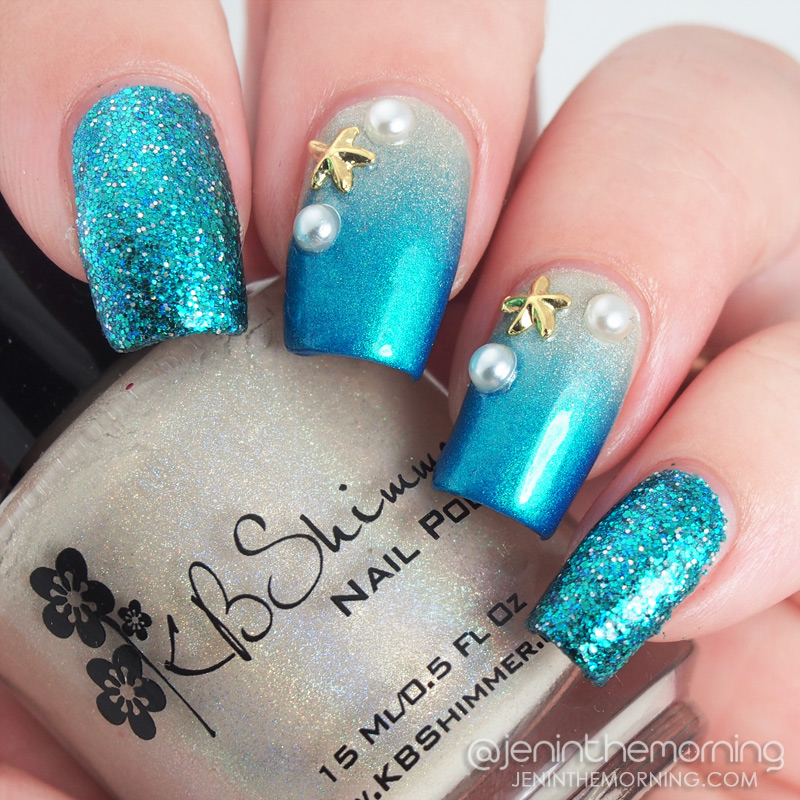 Seashore gradient accent nails featuring starfish charms